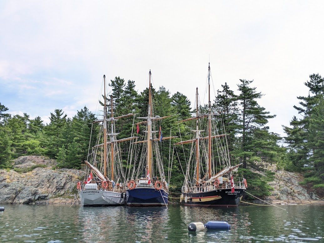 Pathfinder, Playfair and St Lawrence II moored stern-to in the Pool, Baie Fine