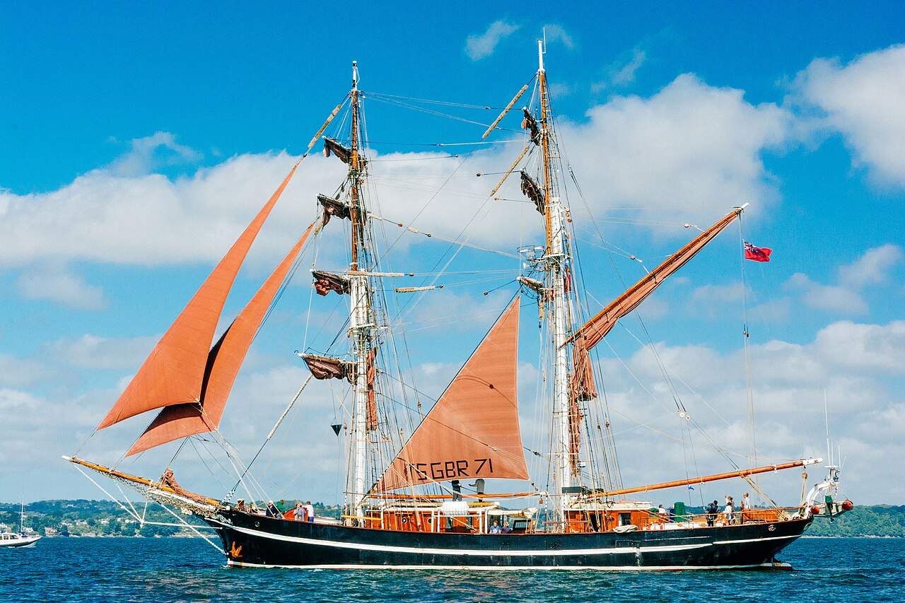 Eye of the Wind under tan sails